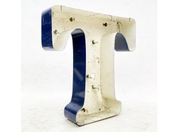 A Vintage Neon Sign Uppercase 'T'