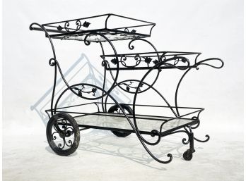 A Vintage 1950's Three Tiered Wrought Iron And Glass Tea Or Bar Cart By Salterini