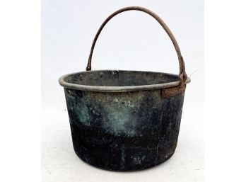 A Massive Antique Copper Cauldron