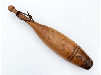 A Large Wooden Bowling Pin Or Juggling Bat