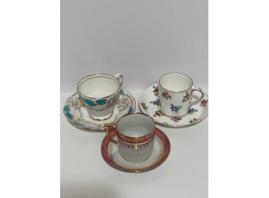 Assorted Set Of Three (3) Demitasses And Saucers