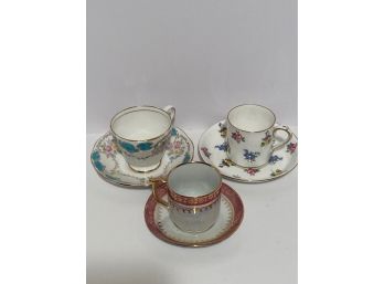 Assorted Set Of Three (3) Demitasses And Saucers
