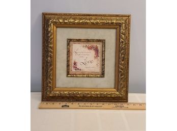 Love Saying Print In A Gold Colored Frame