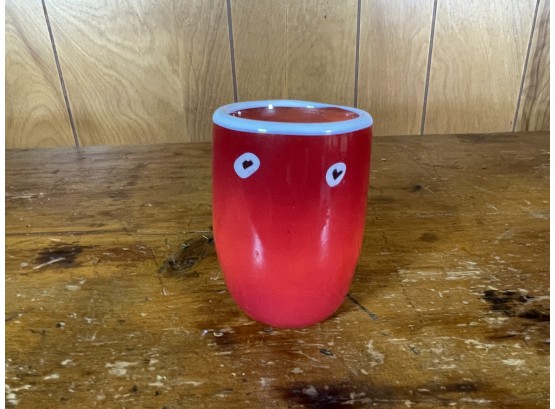 A SMALL MIDCENTURY MODERN RED GLASS VASE