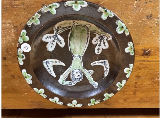 A MIDCENTURY POTTERY CHARGER SIGNED SOHOLM, 1948