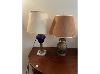 TWO ANTIQUE LAMPS, ONE A COBALT CONVERTED OIL LAMP AND ANOTHER A BRONZE LAMP
