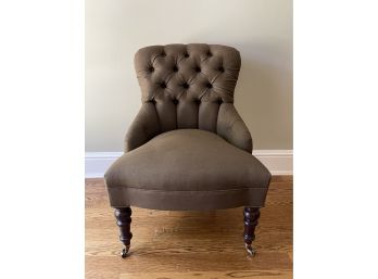 Brown Tufted Arm Chair On Casters