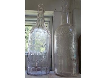 Two Clear Glass Bottles - Hayner Distilling & Whiskey