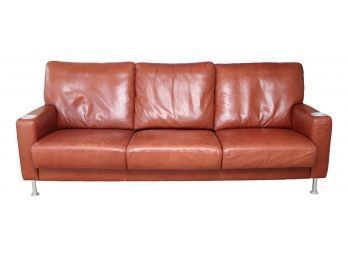 Three Cushion Cognac Leather Sofa With Channel Back And Brushed Aluminum Cup Holders