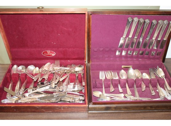 Two Boxes Loaded With Silverware And Silver Plate Utensils