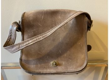 Coach Natural Leather Messenger Bag With Adjustable Shoulder Strap And Brass Toggle Clasp
