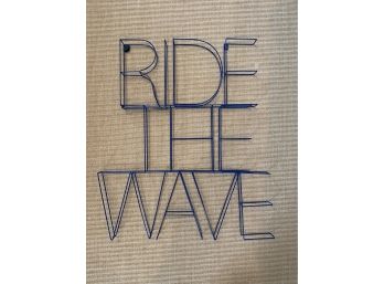 'Ride The Wave' Blue Coated Metal Sign