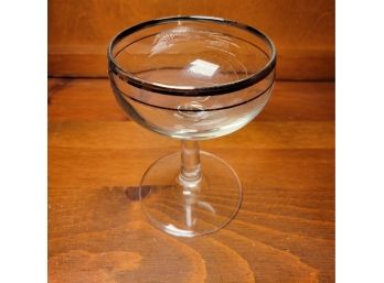 Silver Rimmed Coup Style Glasses