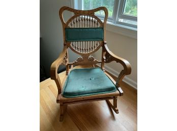 Antique Hand Carved Rocker With Green Upholstery