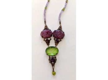 Unusual Vintage Silhouette Cameo In Chartreuse Green With Amethyst Colored Stones