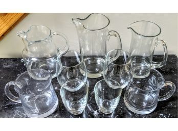 Set Of 9 Glass Items, 3 Pitchers, 2 Glass Mugs, And 4 Glasses