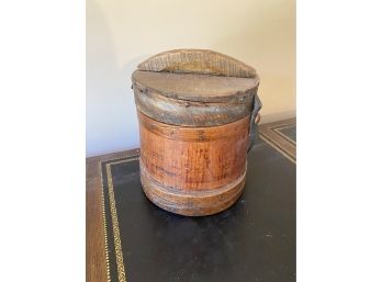 An Antique Wood Bucket With Lid