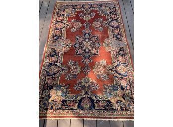 A Vintage Hand Made  Blue, Brown & Red Area Rug