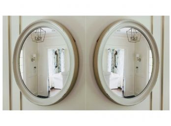 Pair Of White Oval Mirrors