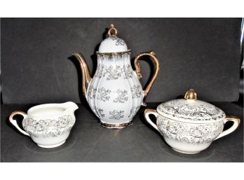 Vintage Sterling China Japan Teapot, Creamer. And Sugar Bowl In The Gold Lace Pattern