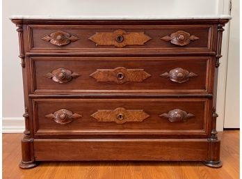 Beautiful Three Drawer Marble Top Chest Of Drawers With Carved Pulls And Burl Details