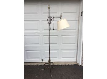 Vintage Iron And Brass Adjustable Floor Lamp. Measures 67 1/2' Tall. Works Perfectly.