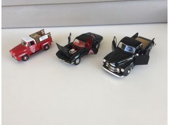 3 Die Cast Cars And Trucks. Ertl Chevrolet Corvette, Ford Pick Up Truck, Chevrolet Pick Up Truck.