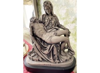 Religious Sculpture Of Mother Mary With Jesus After Cruxifiction
