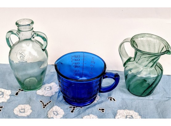 Blue 2 Cup Measuring Cup, Green Glass Jug, And Green Glass Pitcher