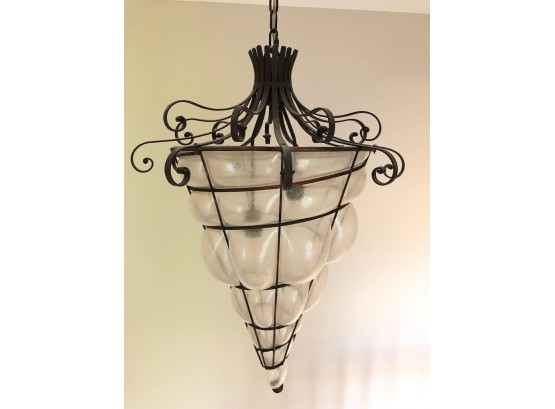 An Incredible Murano Caged Glass Chandelier In Spiral Shell Form With Wrought Iron Detailing