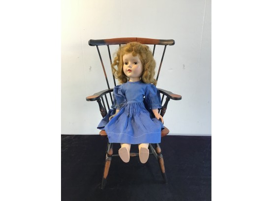 Doll In Blue Dress With Wooden Arm Chair
