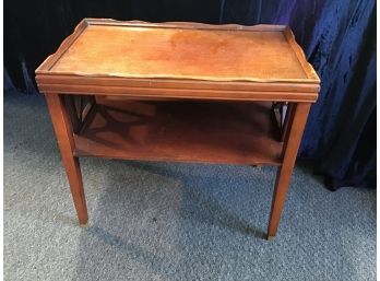 Coffee Table With Raised Edge Along The Top