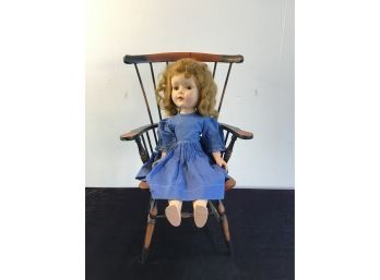 Doll In Blue Dress With Wooden Arm Chair