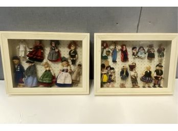 Collection Of Dolls Mounted In Display Cases
