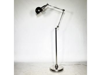 A Modern Chrome Standing Lamp