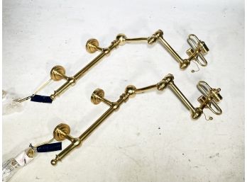 A Pair Of Ralph Lauren Articulating Arm Brass Wall Sconces