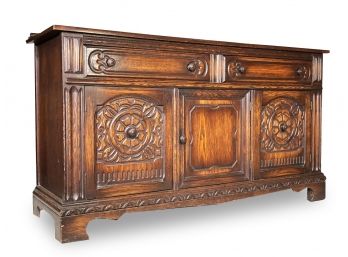 A Vintage Carved Oak Buffet Or Credenza By James McCreery & Company.
