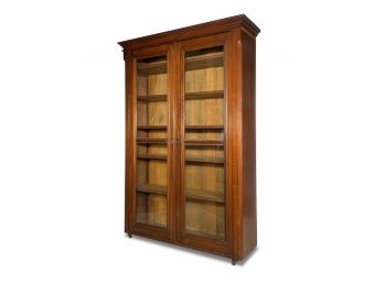 An Amazing Antique Mahogany Book Case With Paneled Glass Doors