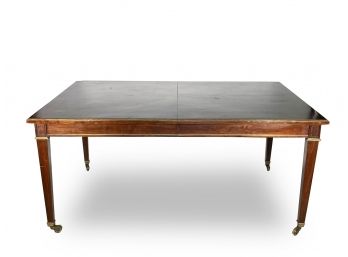 A Large Vintage Solid Wood Extendable Dining Table