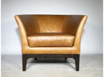 A Chestnut Leather Club Chair By West Elm
