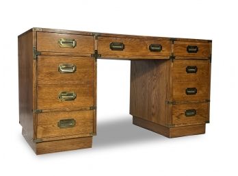 A Kneehole Desk In Campaign Style By Bernhardt Furniture