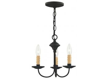 An Iron 'Heritage' Mini Chandelier By Livex Lighting
