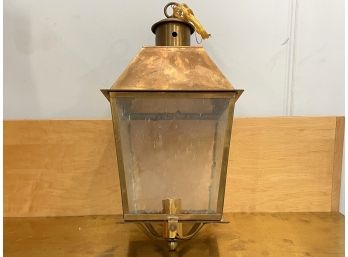 An Antique Brass And Seedy Glass Hanging Lantern