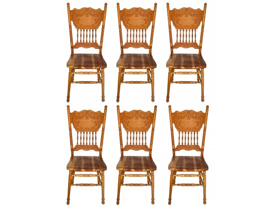 A Set Of 6 Carved Oak Spindle Back Side Chairs