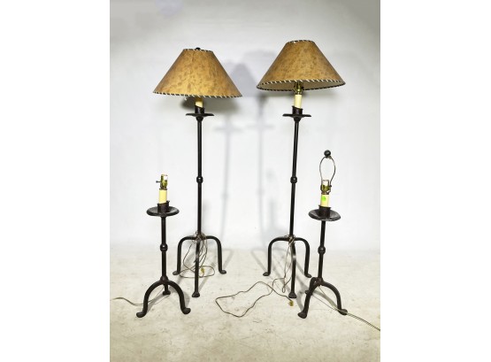A Collection Of Wrought Iron Lamps