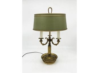 A Vintage Brass Lamp With Metal Shade