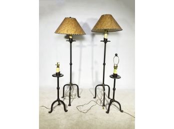 A Collection Of Wrought Iron Lamps