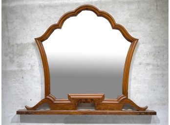 A Large, Carved Wood Framed Beveled Mirror