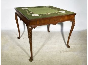 A Vintage Carved Wood Equestrian Needlepoint Themed Game Table