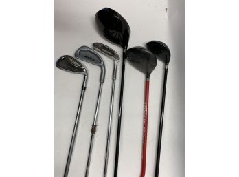 Mixed Group Of Golf Clubs